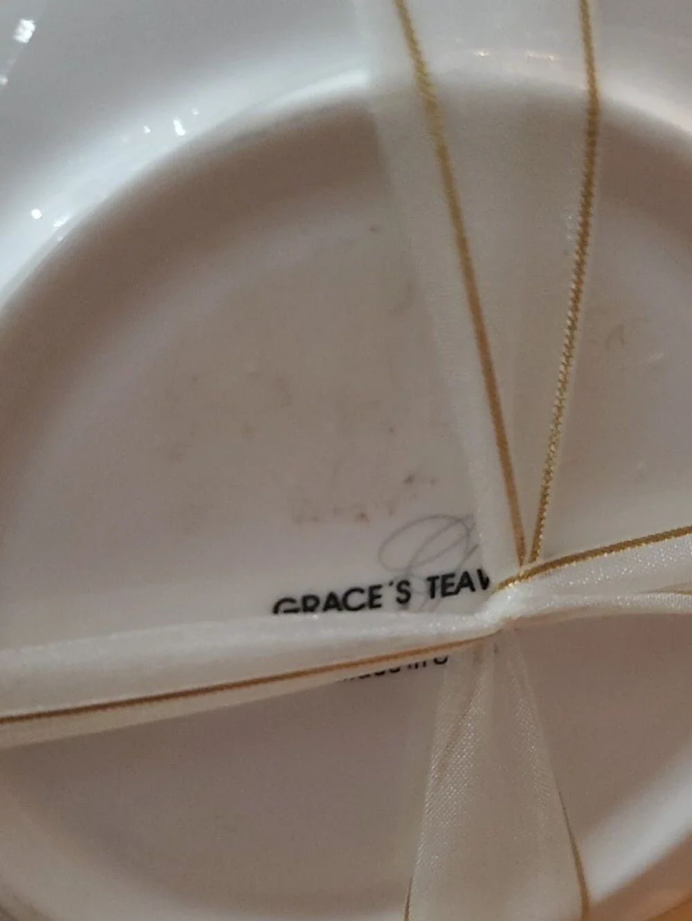 White and Gold Porcelain Teacup & Saucer - Decorative Pattern